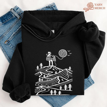 A Camper Knitting The Sun Hoodie