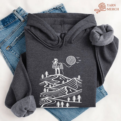 A Camper Knitting The Sun Hoodie