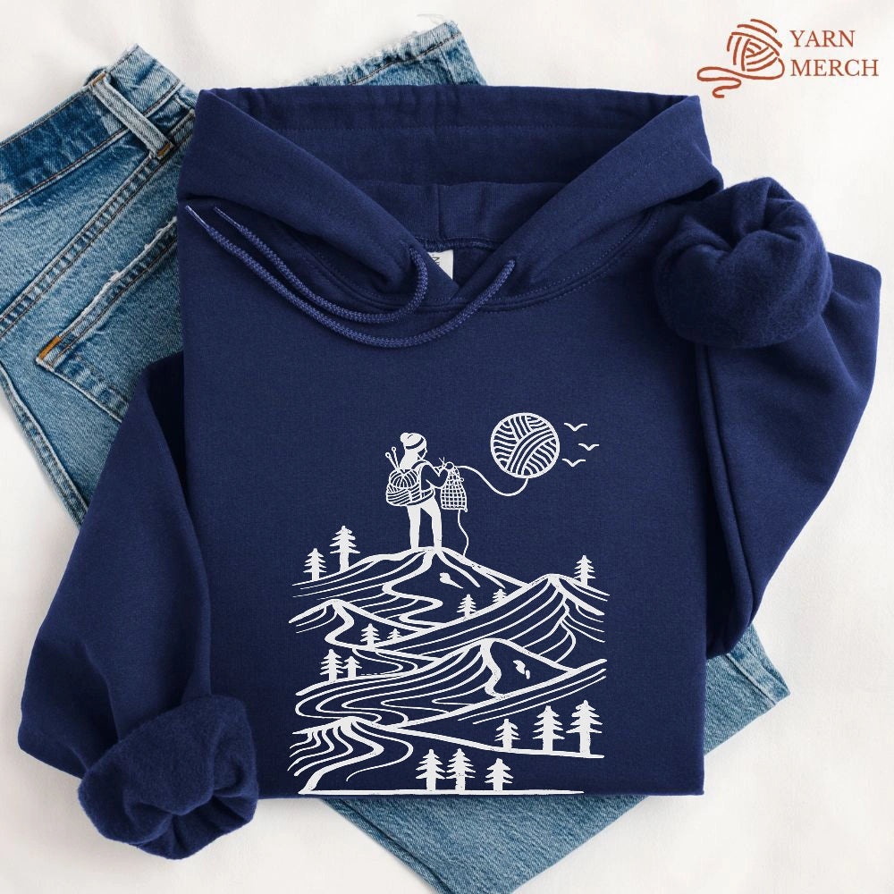A Camper Knitting The Sun Hoodie