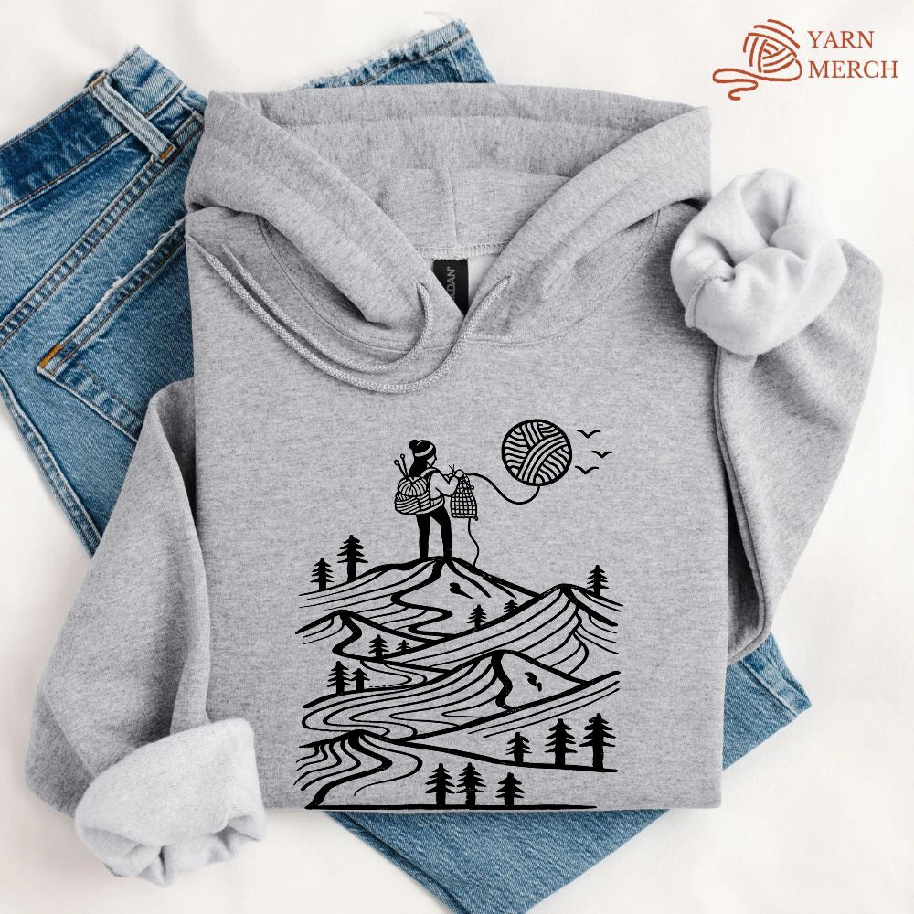 A Camper Knitting The Sun Hoodie
